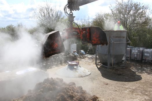 Excavator selection for landfill operations - Undercarriage, guarding, and contamination control