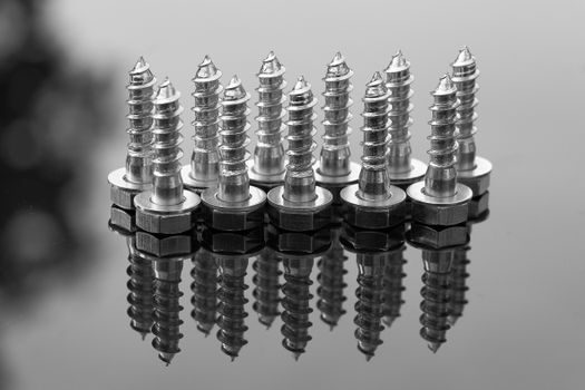 screw machine part types and applications - Application Map by Material and Tolerance Band