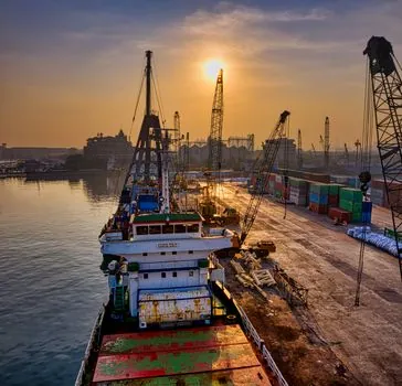 AGV Robot selection for port logistics - Connectivity, Power, and Total-Cost Gates