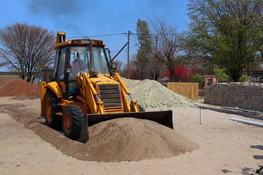 Backhoe Loader selection for demolition projects - Selection Criteria: Carriers vs Demolition Hammers