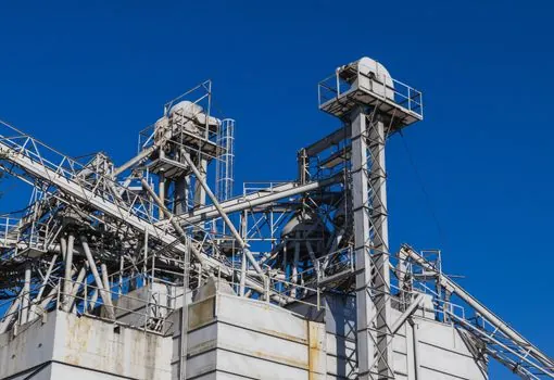 Bucket Elevator selection for automotive parts logistics - Drive package, foundation, and the items buyers under-spec