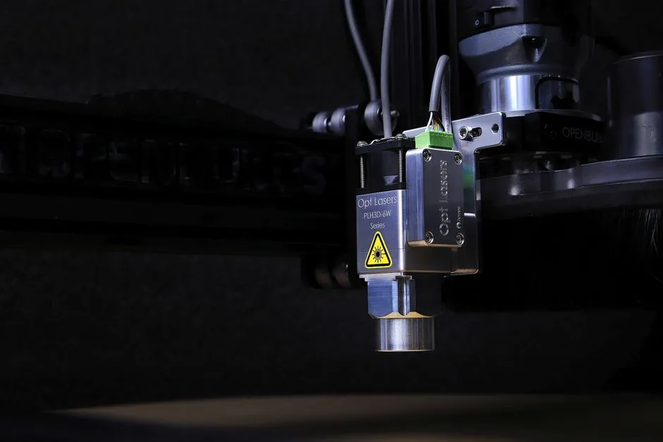 Conveyor cell laser displacement sensor selection: stand-off, spot, target, interface