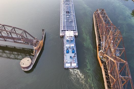Overhead Conveyor selection for chemical shipping - Side-by-side: overhead vs. floor alternatives for chemical shipping