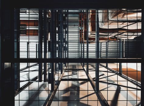 Overhead Conveyor selection for warehouse automation - Limitations, Failure Modes, and Sourcing
