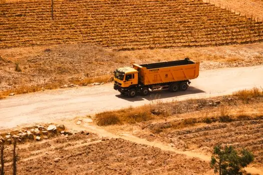 Dump Truck selection for demolition projects - Site Constraints: Access, Grade, and Tipping Surface