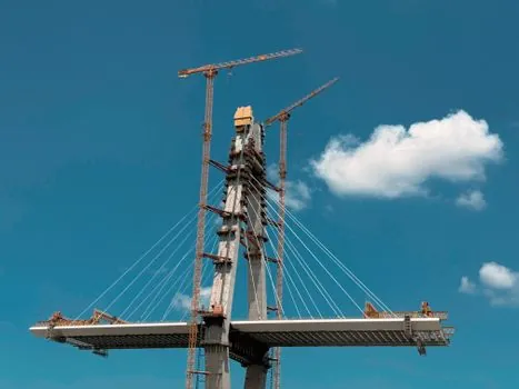 Tower Crane selection for road construction - Foundation, mast, and tie-in: the engineering that decides go/no-go