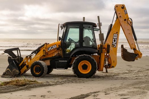 Backhoe Loader selection for tunneling - Diesel Particulate Risk in Confined Headings