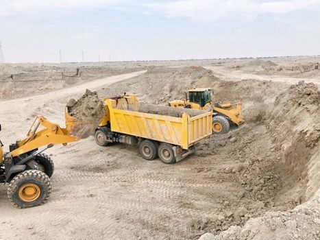 Motor Grader selection for tunneling - All-wheel drive and braking for wet, blasted invert