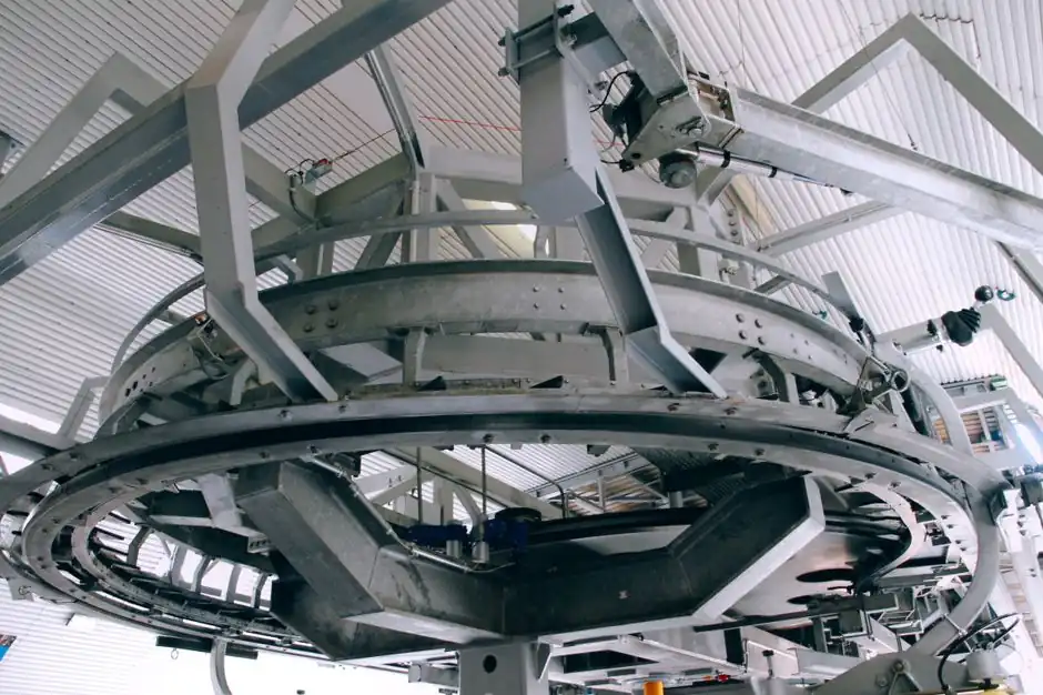 Belt tensioner selection for pulp and paper drives