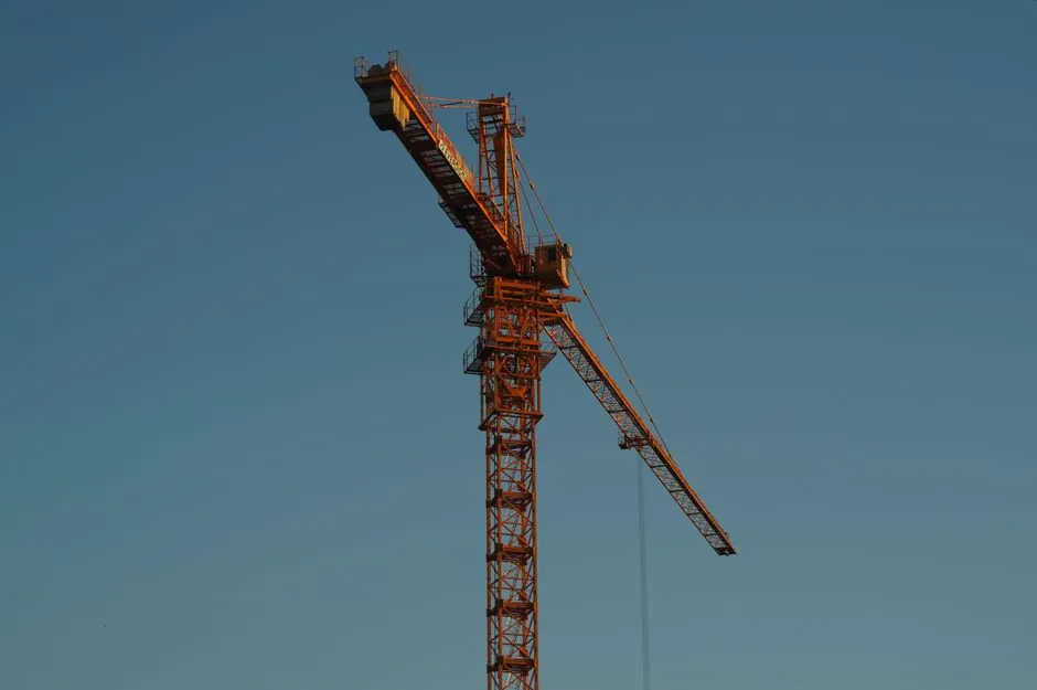Climbing Formwork vs Tower Crane: When You Need One and When You Don't
