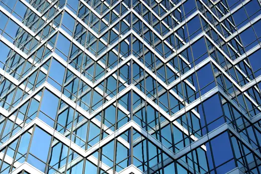 Metal Curtain Wall Panel selection for commercial buildings - Comparing the Five Options on Cost, Thermal, Fire, and Span