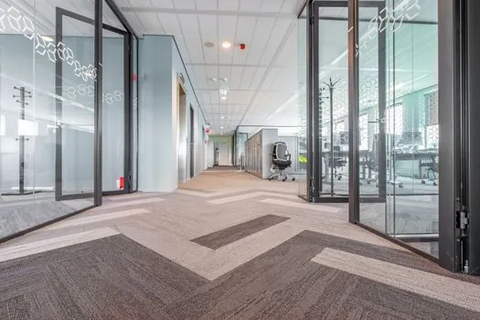 Industrial Flooring selection for schools - Material Comparison: LVT, Sheet Vinyl, Rubber, Carpet Tile, Epoxy