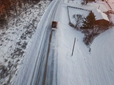 Aerial Work Platform specifications for snow removal - Chassis and Drivetrain: Indoor Electric vs. Rough-Terrain Diesel