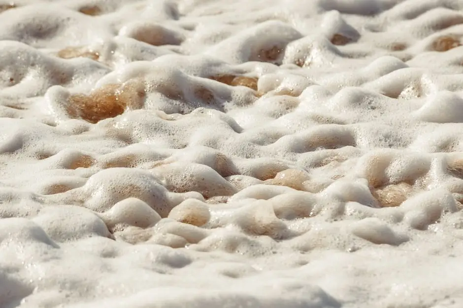 Bubble Cap vs Slotted Nozzle Plates in Sand Cooler Fluidized Beds