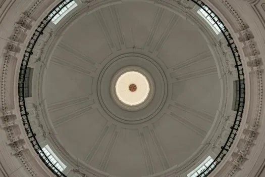 what causes charge hanging and bridging in a cupola shaft? - Burden Distribution, Flux Placement, and Limestone Function