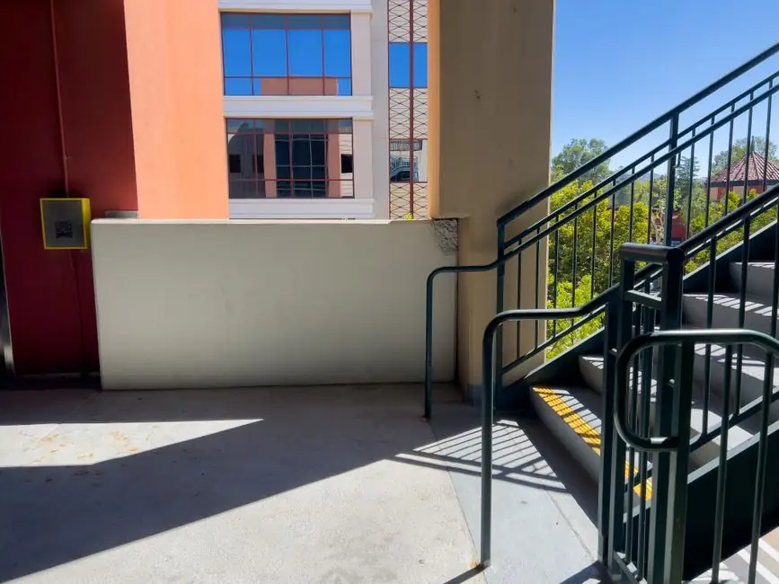 Deck-to-wall membrane termination: heights, laps, and edge protection