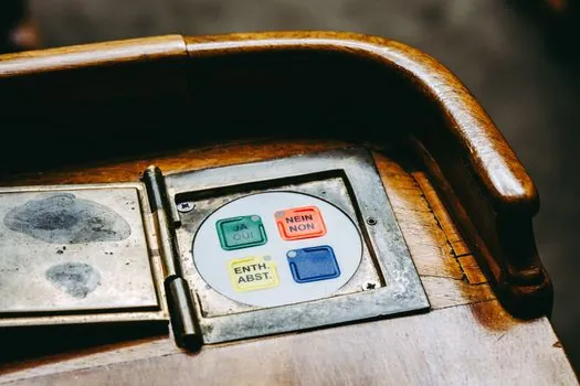 IEC 60417 symbols on illuminated pushbuttons for color-blind operators - Comparing three practical cap+legend options