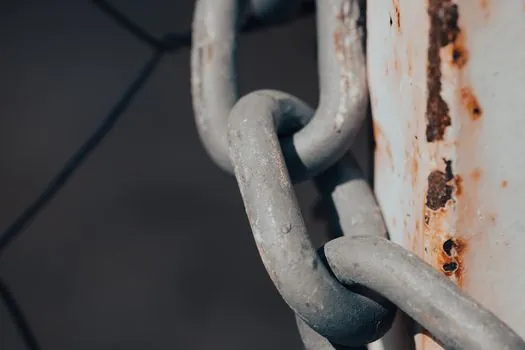 Roller Chain selection for material handling - Material, attachment, and corrosion choices