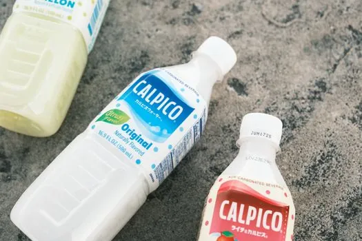 stretch sleeve labeler vs shrink sleeve labeler for PET bottles - Graphics Real Estate and Tamper Evidence