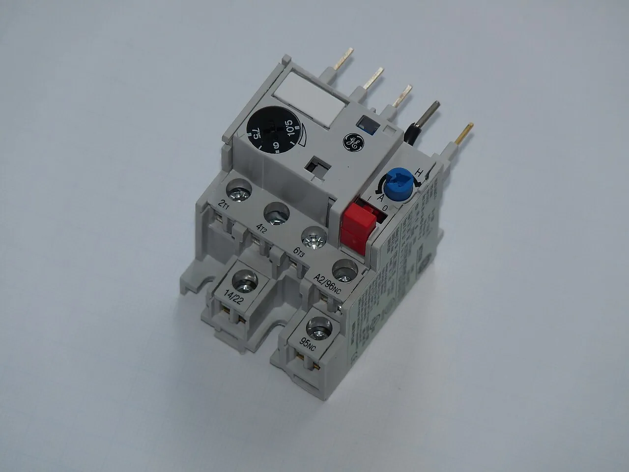 GE MTO3N three-phase bimetallic thermal overload relay, showing the amp-graduated current adjustment dial, three power terminals (2T1, 4T2, 6T3), 95-96 auxiliary contact terminals, red test/trip button, and reset selector